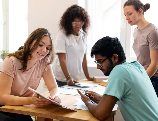 Students engaged in a discussion in a stress-free environment.